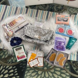 Nwot Victoria secrets Silver Sequin Clutch with Beauty Products